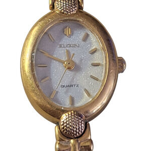 Elgin Ladies  Designer Watch Gold Tone 6 1/2 inches long bracelet new battery